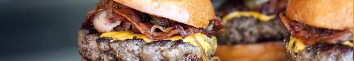 Eating American (Traditional) Burger at Carlson's Drive In restaurant in Michigan City, IN.